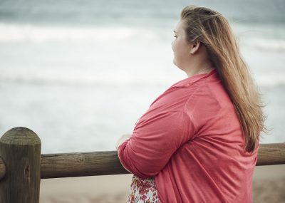 Woman Looking at Ocean - Weight Stigma - Rudd Center for Food Policy and Health